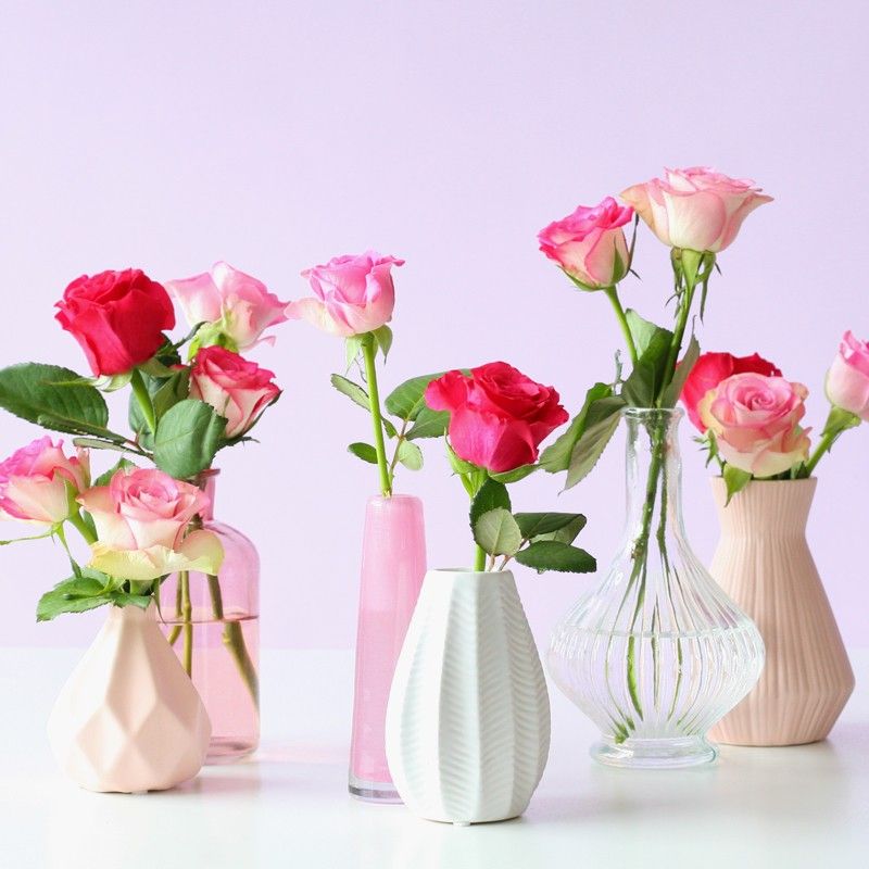 Brievenbuspakketje met verschillende tinten roze rozen