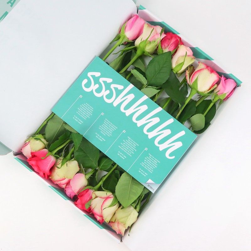 Brievenbuspakketje met verschillende tinten roze rozen