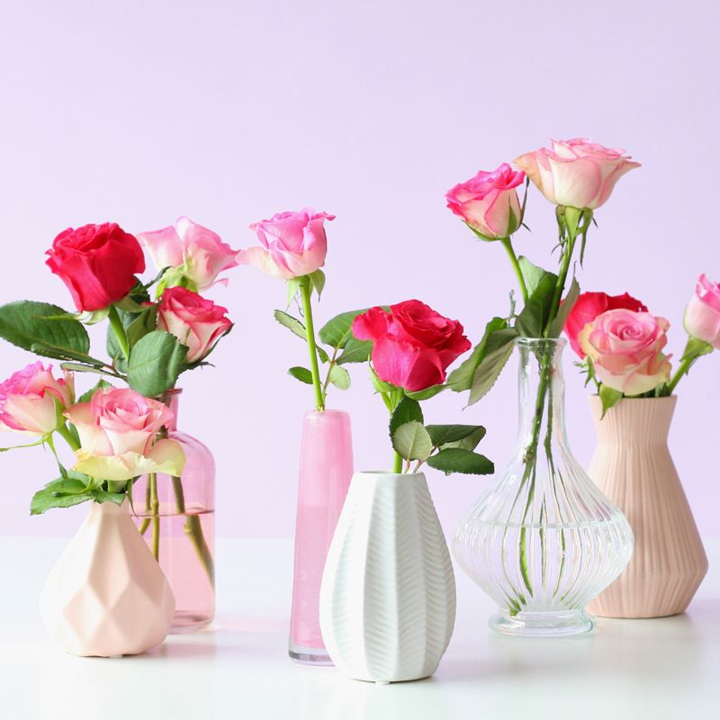 Brievenbuspakketje met verschillende tinten roze rozen