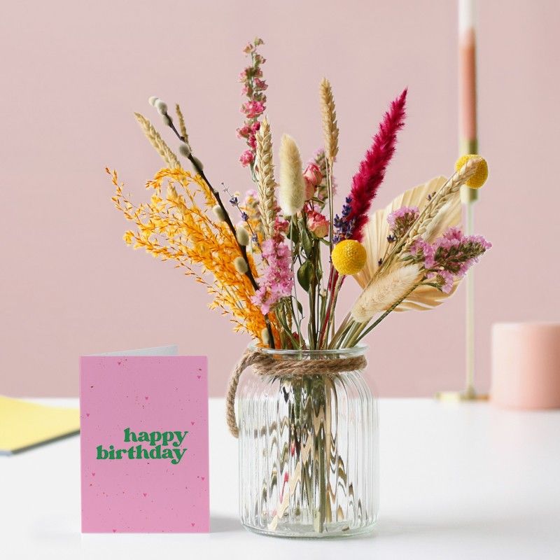 brievenbus droogbloemen in verschillende roze oranje tinten