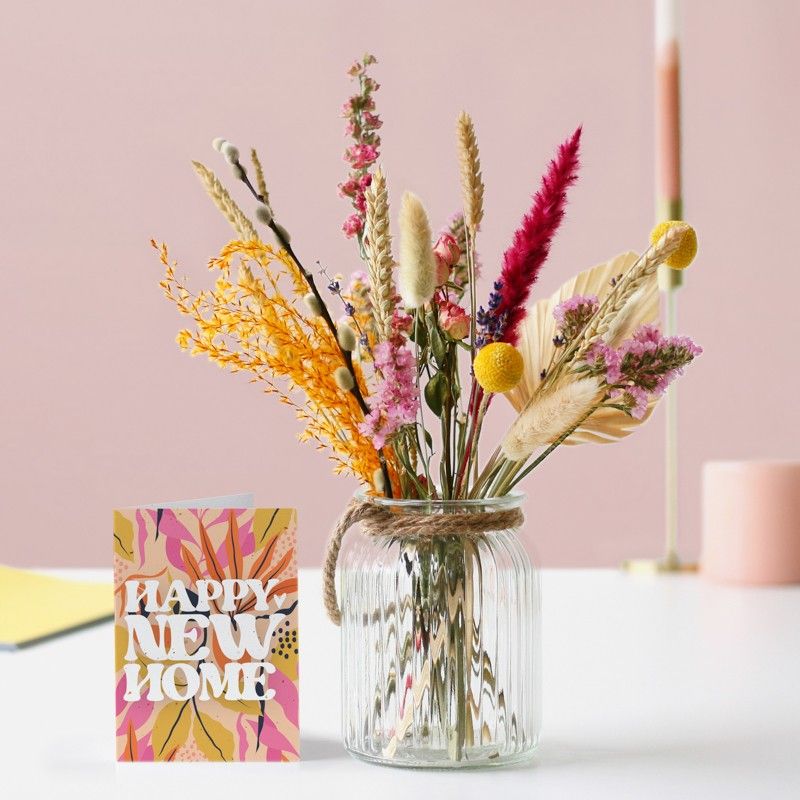 brievenbus droogbloemen in verschillende roze oranje tinten