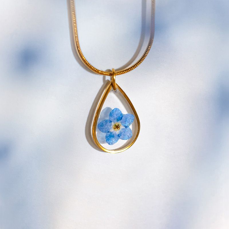 Ketting met vergeet-mij-nietje hanger