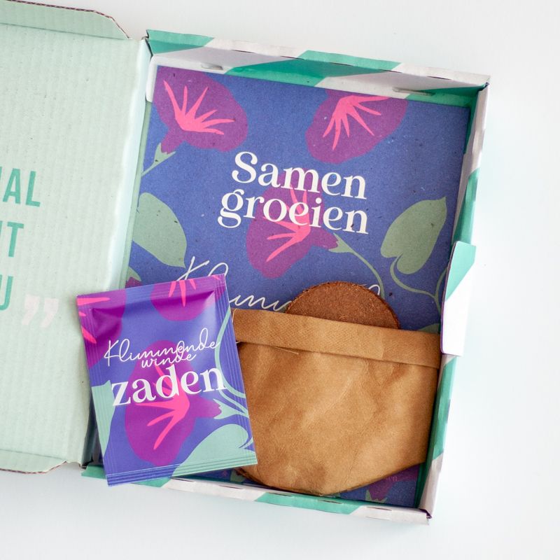 Paars doosje met Klimmende Winde zaden met de tekst samen groeien erop