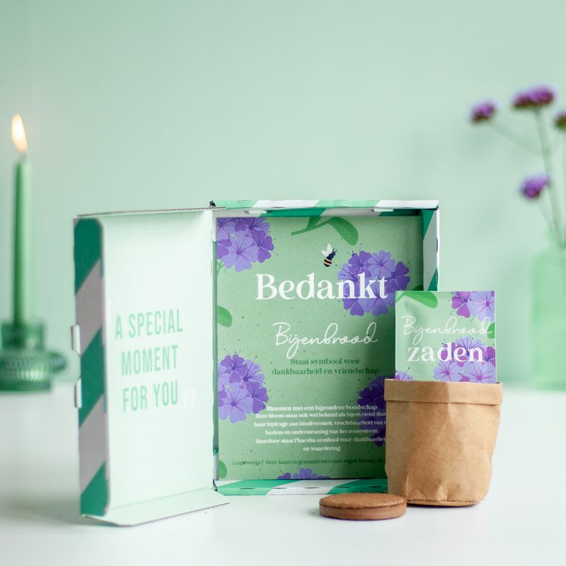 Groen paars doosje bijenbrood met de tekst bedankt erop