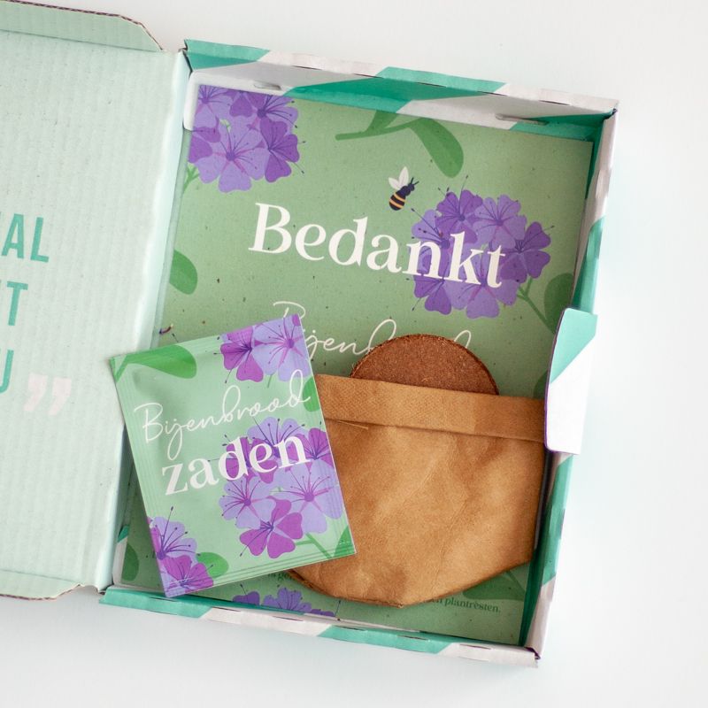 Groen paars doosje bijenbrood met de tekst bedankt erop